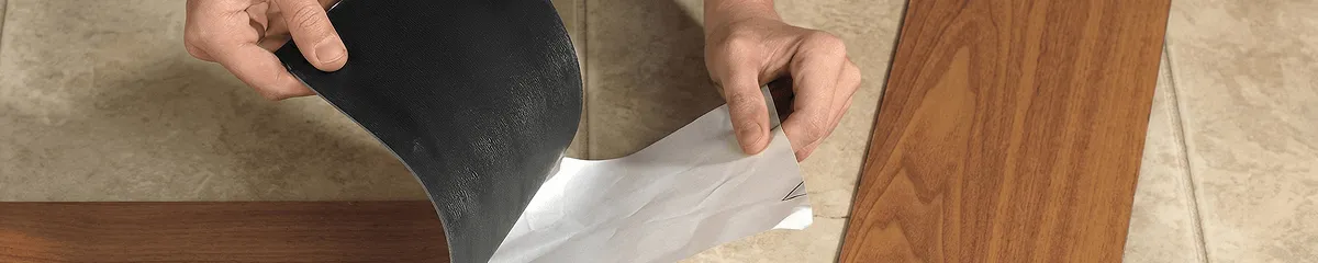 A professional installing vinyl flooring in Nashville, TN